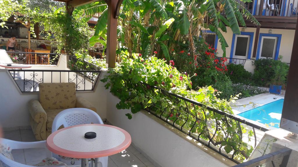 Paradise Garden Gumusluk Evleriアパートホテル 部屋 写真